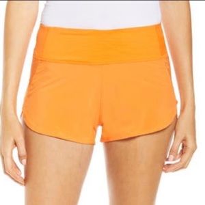 Outdoor Voices 2.5 Hudson Shorts in Clementine